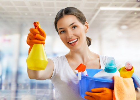 Professional carpet cleaner in Barnet cleaning a living room carpet