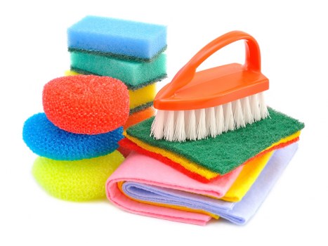 Trained carpet cleaner using professional equipment during a safety-focused service